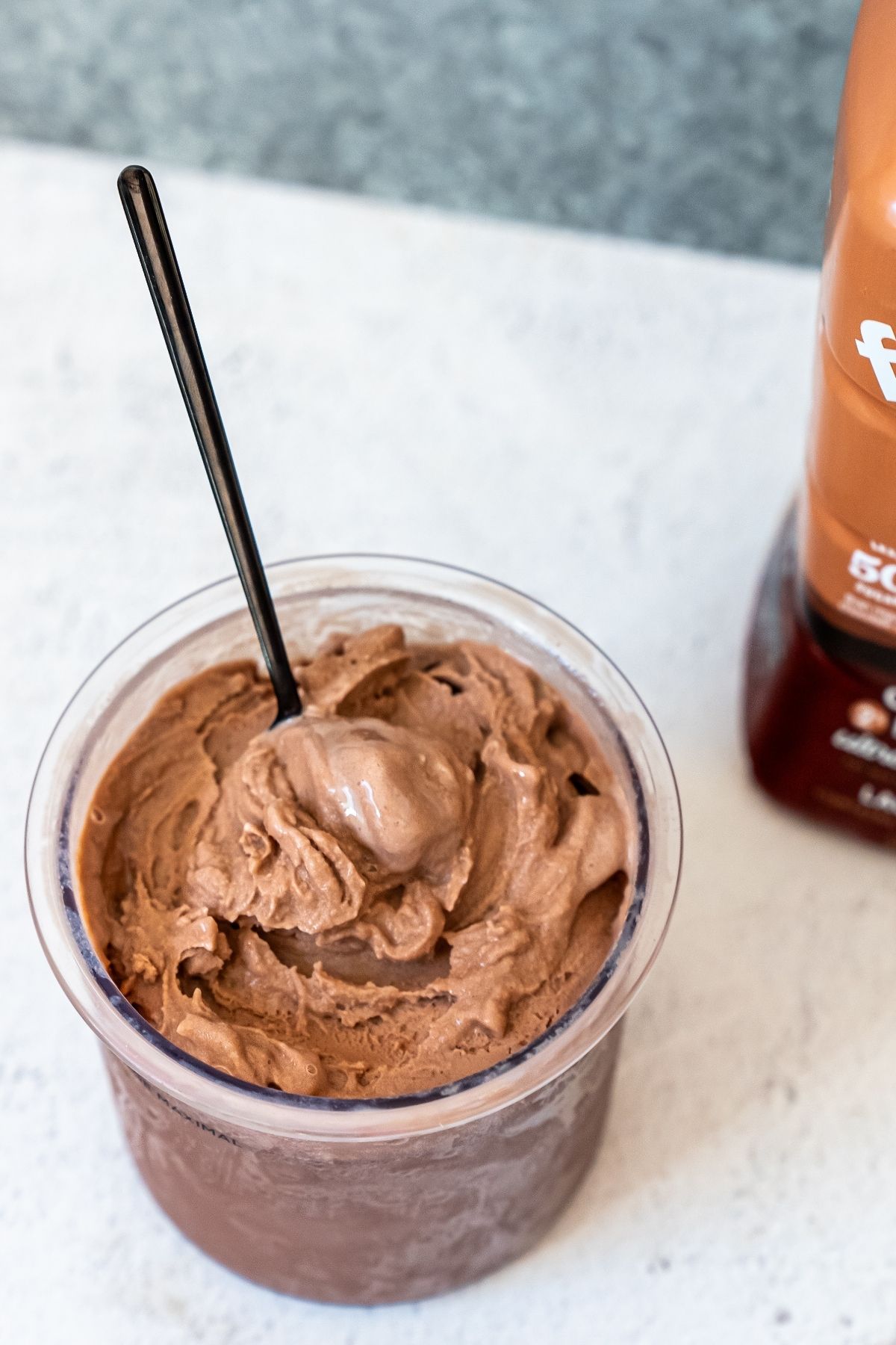 Chocolate Fairlife milk ice cream with spoon