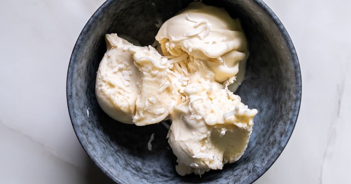 A black bowl filled with three scoops of creamy ice cream, made using the Ninja Creami.