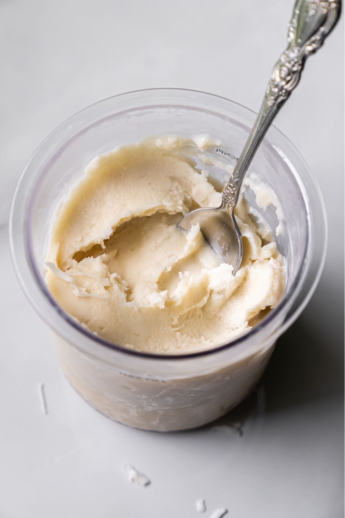 Ninja Creami Oat Milk Coconut Protein Ice Cream with spoon
