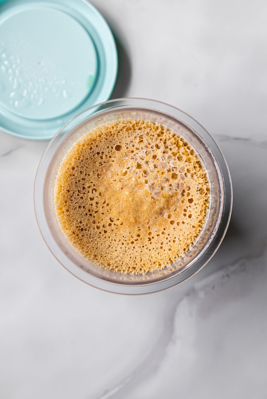 Freezed Oat Milk Protein Coffee ice cream mix in a clear pint