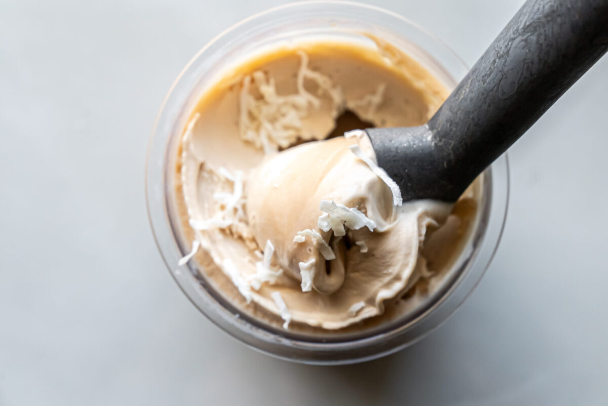 A delicious scoop of Ninja Creami Pina Colada Protein Ice Cream, emphasizing its rich and creamy appearance.