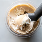 pina colada ice cream topped with shredded coconut flakes.