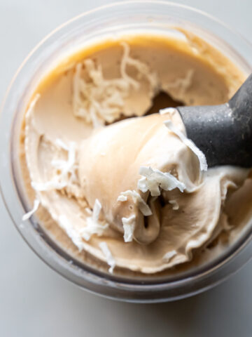 pina colada ice cream topped with shredded coconut flakes.