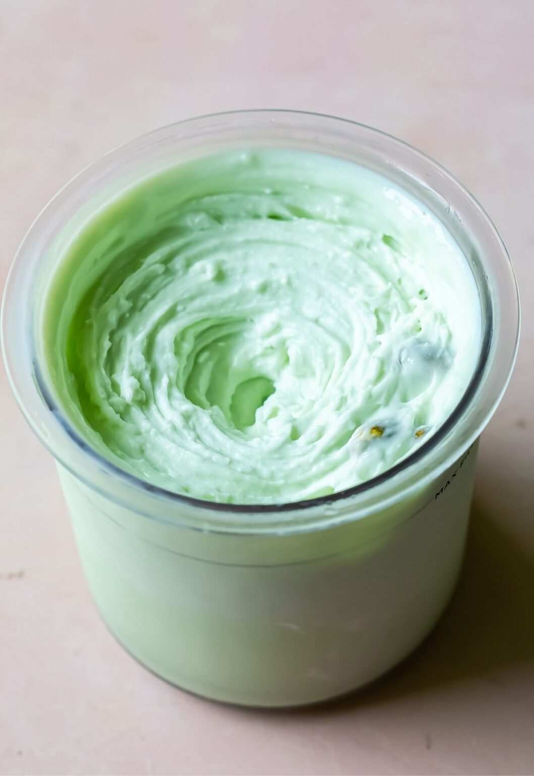 Pistachio Protein Ice Cream swirled in a pint