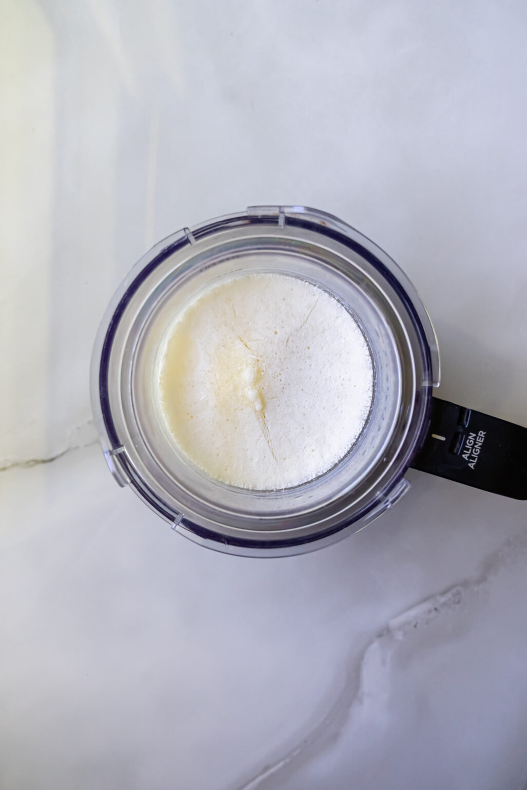 in progress shot of lemon protein ice cream.